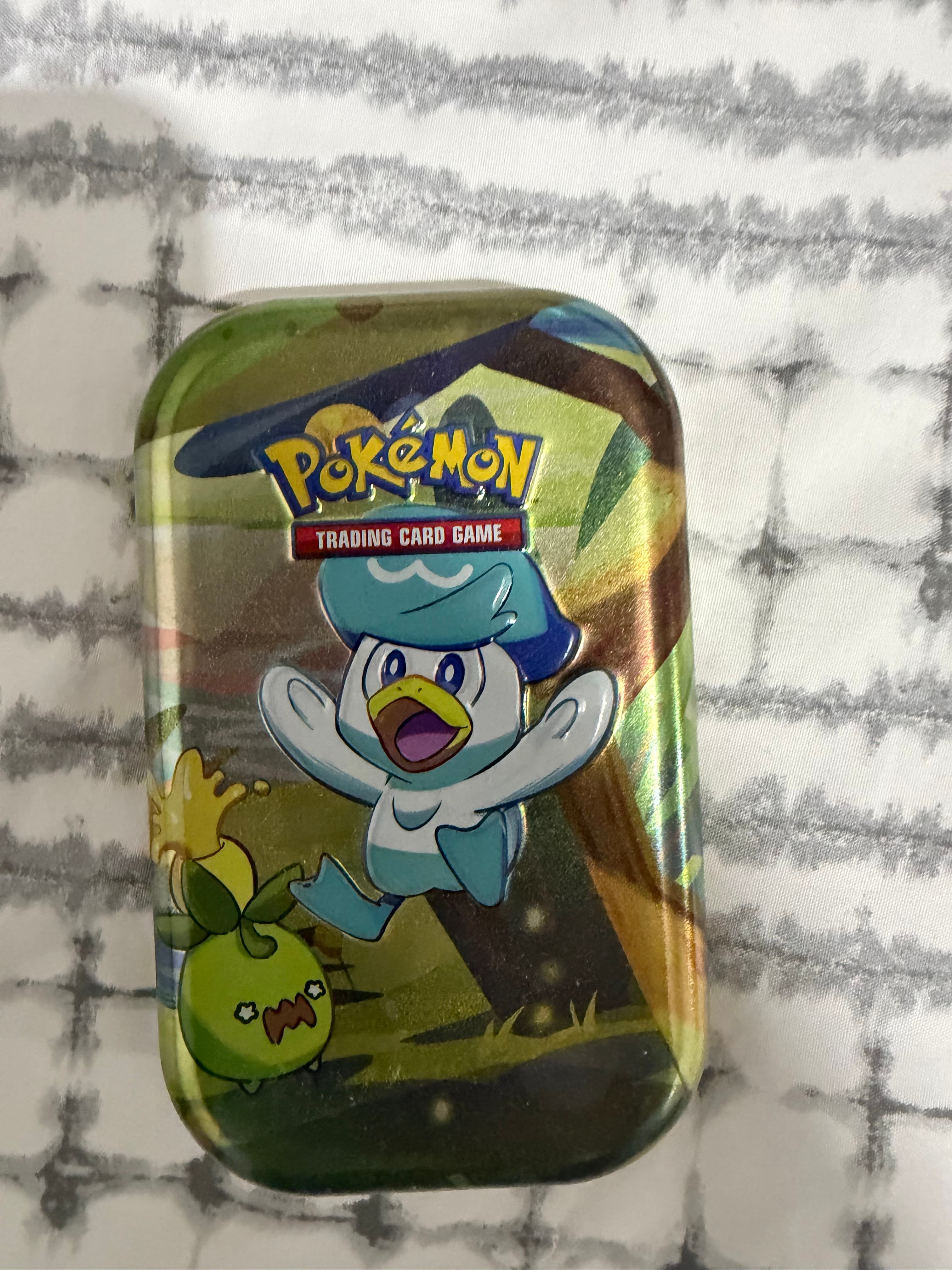 Lata mini Pokémon TCG Paldea Friends Quaxly y Smoliv